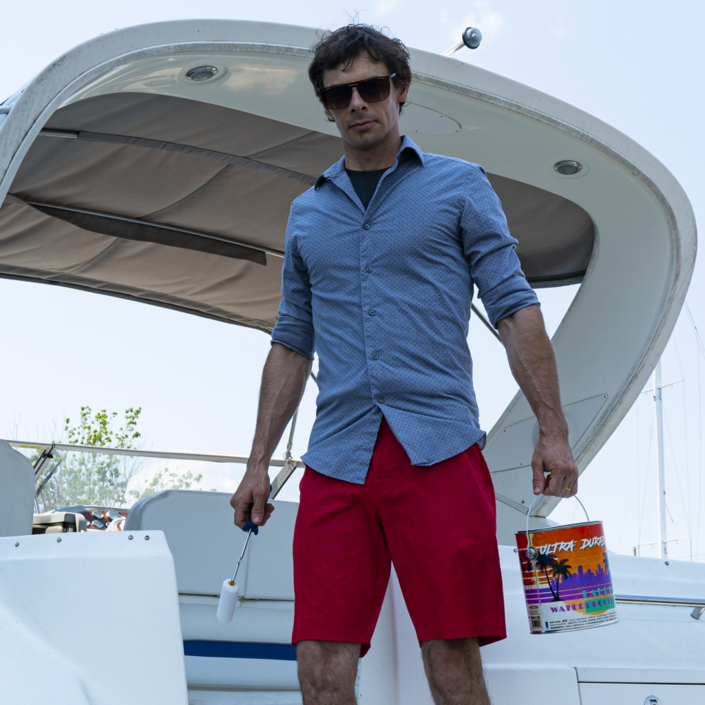 Max on a boat with marine fabric waterproofer
